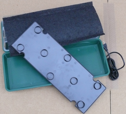 Der Wassertank des elektrischen Zimmergew�chshauses